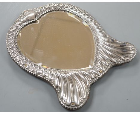 A late Victorian repousse silver mounted heart shape easel mirror, William Comyns, London, 1900, 26.5cm.