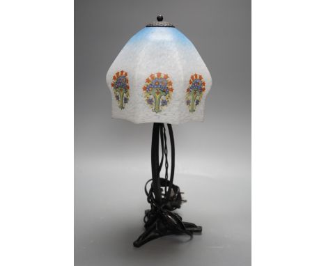 An Art Deco wrought iron table lamp on tripod base with frosted glass shade, 38cm tall