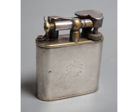 A vintage 1930’s Dunhill Unique Sports plated nickel cigarette lighter.