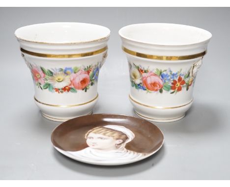 A 19th century pair of Paris porcelain flowers pot with Chinese figural heads, a chain of flowers and four gilt bands and a C