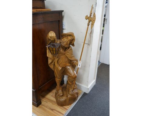 A carved wood figure of a gate keeper, height 110cm