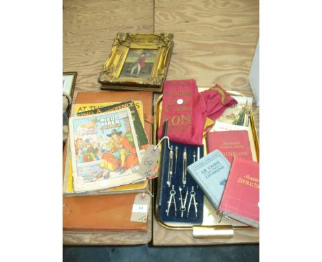 Three vintage children's annuals, a reproduction painting , portrait of a golfer, a folding leather writing case, cased geome