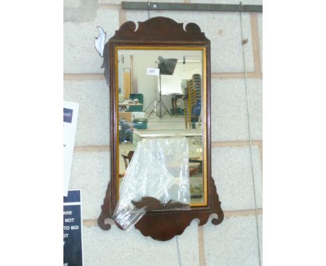 A Chippendale style mahogany wall mirror.