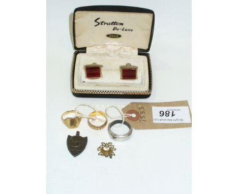 An 18ct Gold wedding band, a 9ct gold signet ring , a white metal band, cuff links, etc.