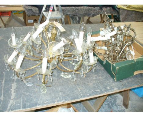 A Gilt metal and droplet ten branch chandelier and a silvered eight branch chandelier.