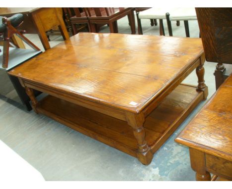 A Contemporary rustic oak three plank top coffee table with under shelf.