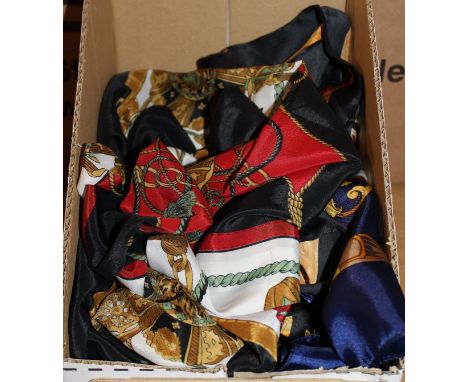 A box containing seven various silk scarves to include Hermes, Chanel, Versace, Swarovski etc   CONDITION REPORTS  Various ma