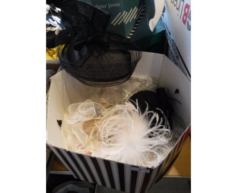 A Celine Robert sinamay black hat together with a Failsworth black hat, two cream fascinators, a Phillip Treacy purple hat an