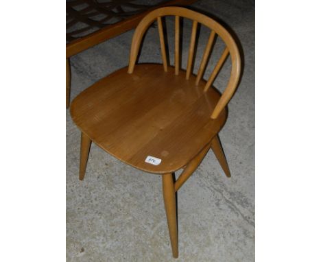 A light elm Ercol seated chair with low beech spindle back and beech turned supports    CONDITION REPORTS  Basically sound co