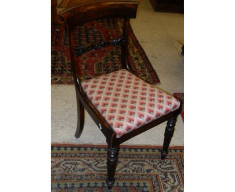 A set of six Victorian simulated rosewood bar back dining chairs with drop in seats, a Regency mahogany bar back carver chair