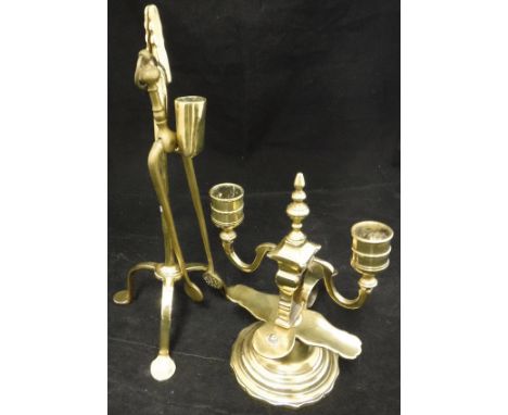 A brass rush light and miniature pair of fire tongs, together with a brass twin branch chamber stick