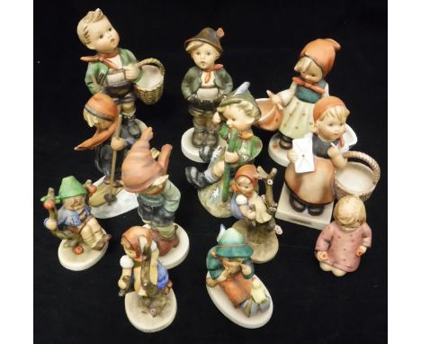 A collection of Goebel Hummel figures including "Apple Tree Boy", "Mountaineer", "Meditation", "Skier", "One for you one for 