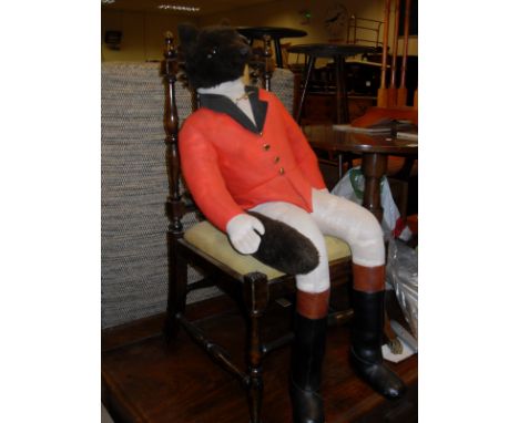 A rosewood effect bedroom chair, a 'fox in hunting regalia' pyjama case, a nest of three yew tables, an oval yew coffee table