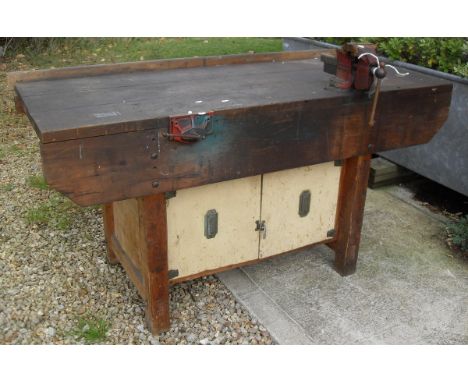 A pine work bench with Record bench vice