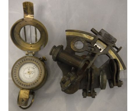 A miniature reproduction sextant inscribed "Kelvin & Hughes 1917" and a miniature reproduction compass inscribed "T G Co Lts 