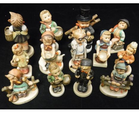 A collection of Goebel Hummel figures including: "Village Boy", "I brought you a gift", "Little Helper", "Sister", "Just rest
