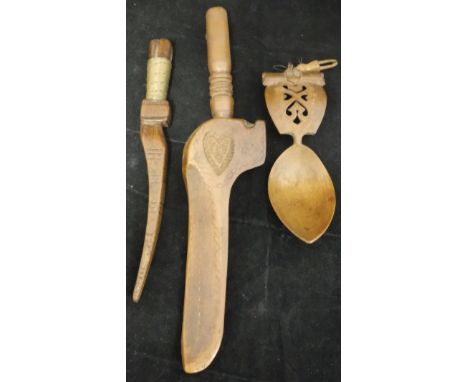 A 19th Century carved treen ware loving spoon and two further treen ware items, one carved with initials "A.B", the other wit