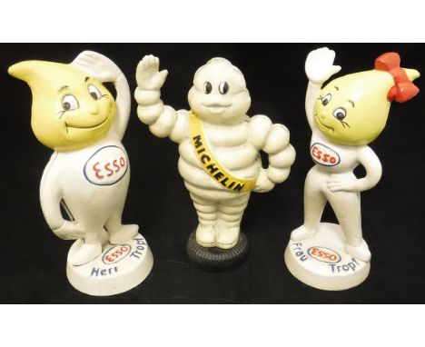 A reproduction painted metal money box "Esso Herr Tropf" and another "Frau Tropf", together with a painted metal Michelin mon