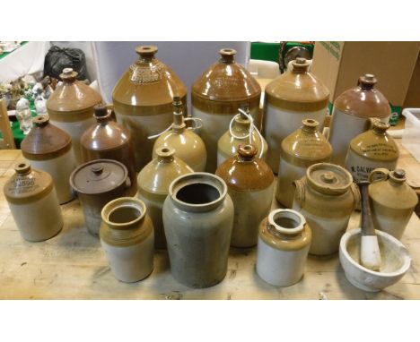 A quantity of various stoneware flagons and jars including examples for The Aylesbury Brewery Company Limited, John White & C