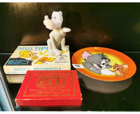 A Tom and Jerry limited edition plate, ceramic cartoon dog and two games.