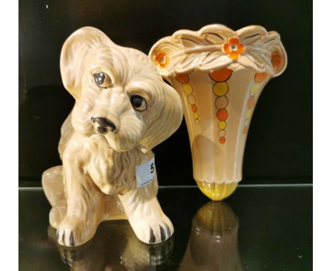 A Sylvac model of a sad puppy together with an Art Deco wall pocket, H. 19cm.