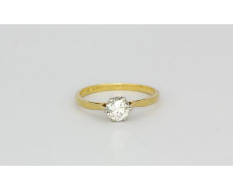 An 18ct yellow gold and platinum brilliant cut diamond set solitaire ring, approx. 0.57ct, (O.5).