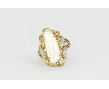 A 9ct yellow gold ring set with a baroque pearl and diamonds, L. 2.5cm, (N).