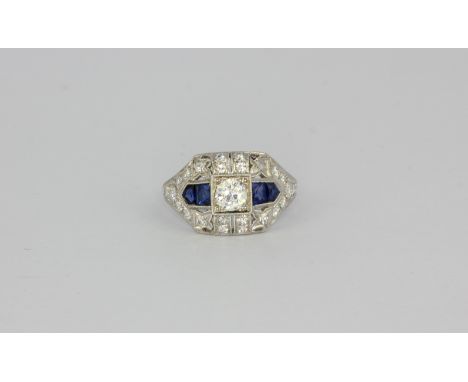 An Art Deco style platinum sapphire and diamond set ring, (M.5).