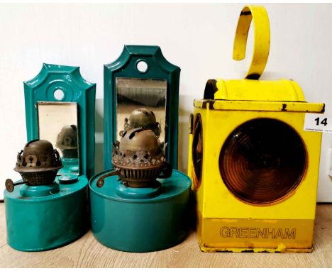 Two painted wall mounted tin oil lamps and a vintage metal roadworkers lamp, wall lamp H. 24cm.