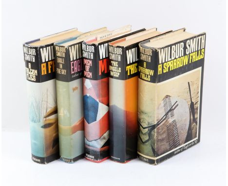 Set of five Wilbur Smith first editions (London: Heinemann), to include: ' A Sparrow Falls', 'The Angels Weep', 'Men of Men',