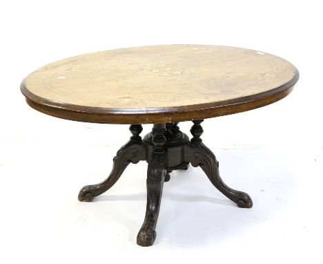 Mid Victorian inlaid walnut snap top table, the oval top on four turned supports and carved cabriole legs, W118 D85 cm, a tri