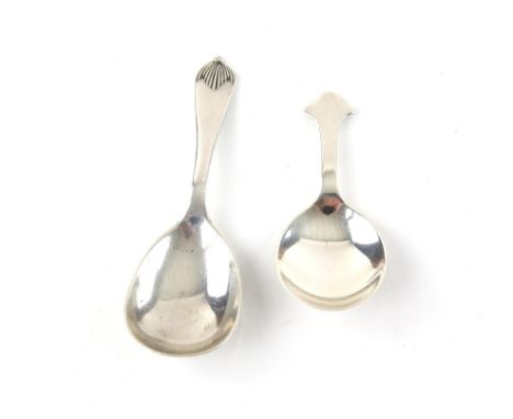 Two silver caddy spoons in varied designs