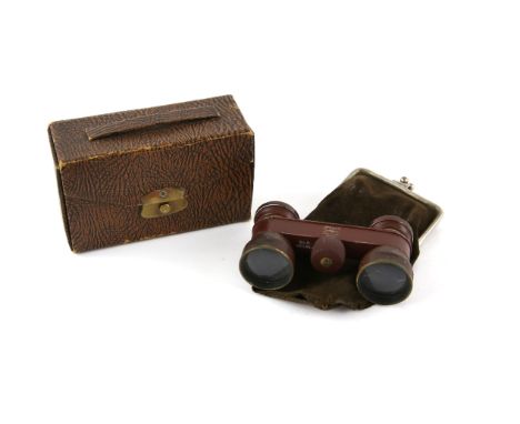 Cased pair of white metal opera binoculars with a stag hunt scene on each lens 3 dogs in chase and another pair of cased oper