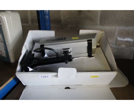 A Sure Cam CCTV dummy camera with original box and fixings