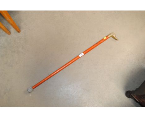 A walking stick with duck handle