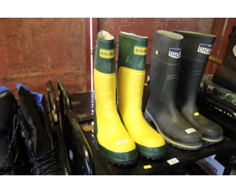 A pair of Boxer safety chainsaw wellington boots with steel toes (Size UK 10)