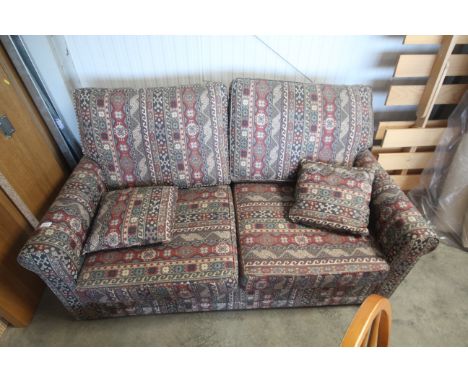 A two seater sofa bed 