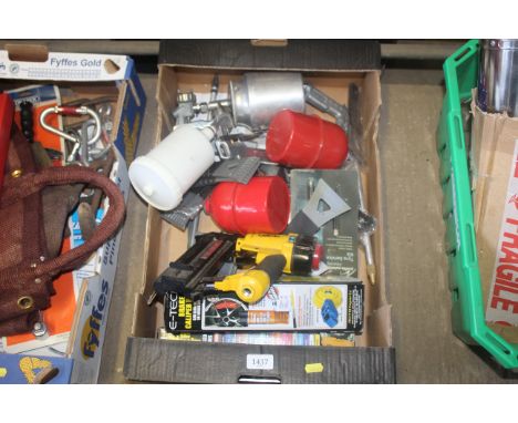 A box containing various items to include air tools, air spray guns, a Cosmoair nail gun, two brake calliper paint can etc.