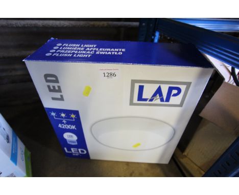 A Lap LED flush ceiling light, as new with original box and fixings