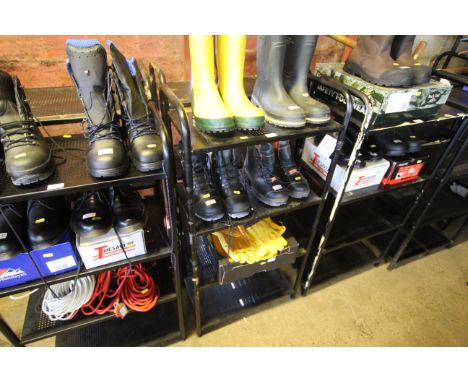 Two four tier metal shelf units