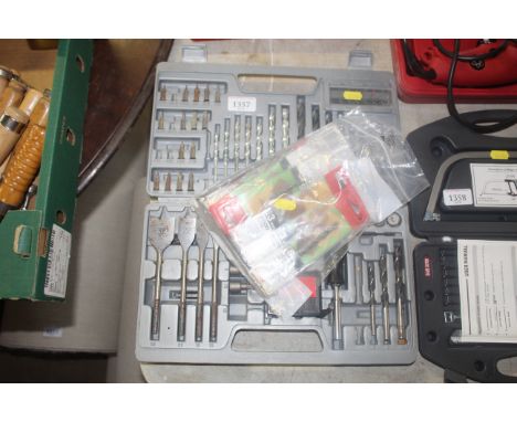 A home tool kit comprising screwdriver, drill bits, tape measure etc.