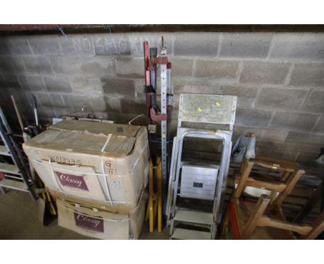 A pair of metal folding clamps and a quantity of metal sash clamps