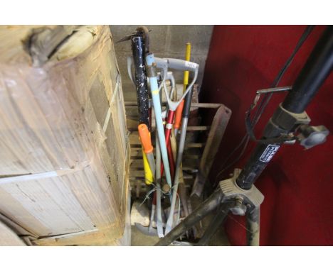 A quantity of gardening tools including shears, digging fork, spade etc