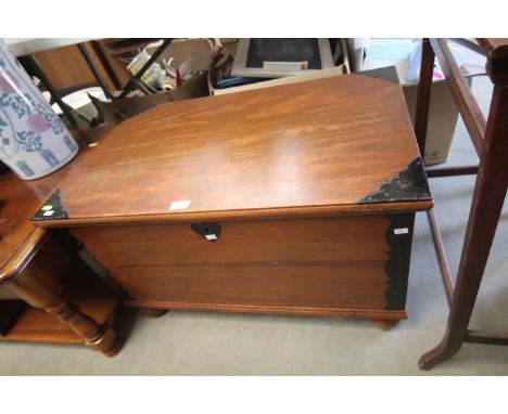 A pine and metal mounted trunk