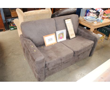 A two seater sofa bed 