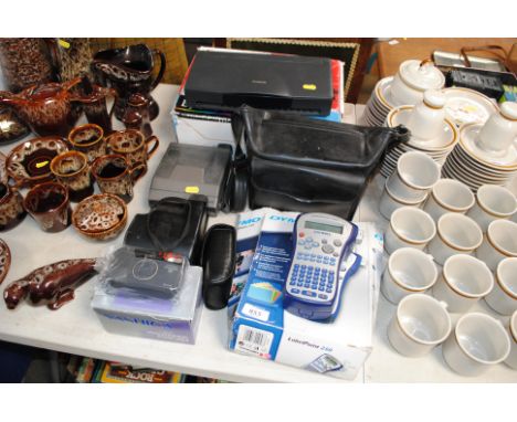A Dymo label printer, two polaroid cameras and various other camera items, a Cannon portable printer etc