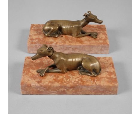Paar figürliche Buchstützen1. Hälfte 20. Jh., ungemarkt, Bronze bräunlich patiniert, vollplastische Darstellung zweier liegen