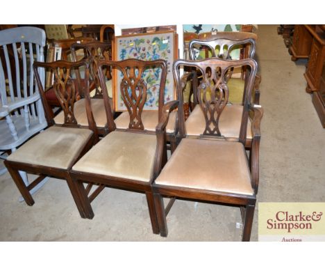 A set of six Chippendale style mahogany dining chairs 