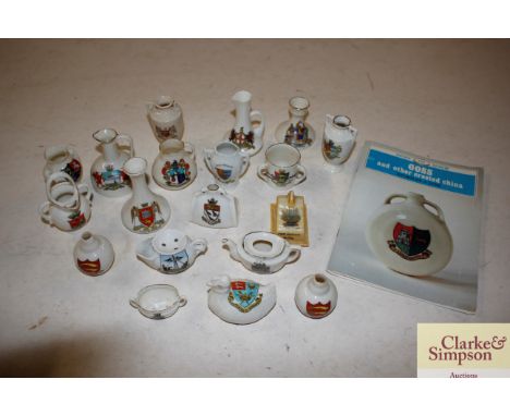 A quantity of Goss and other crested souvenir china; and a Goss and Other Crested China album