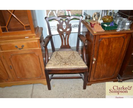 A mahogany Chippendale style elbow chair